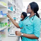 Woman adjusting medicine package